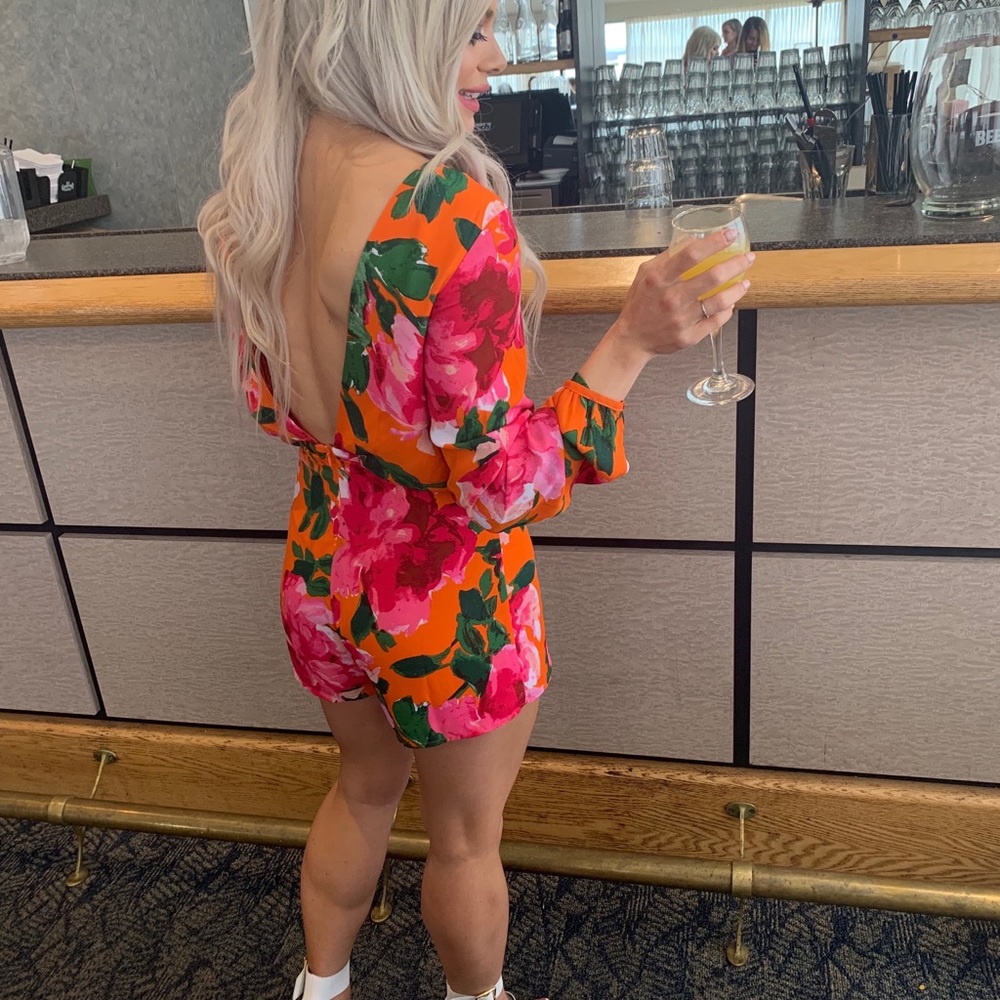 Deep V back floral romper